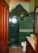 Kismet St John Sunrise Suite Bathroom with Green Moroccan Tile